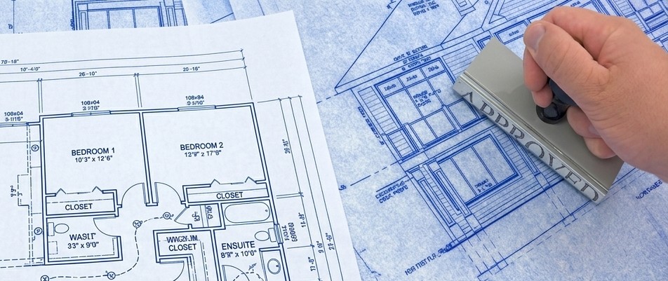 An architectural blueprint being approved