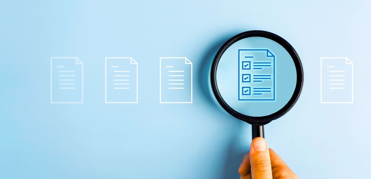 Magnifying glass and cheklist